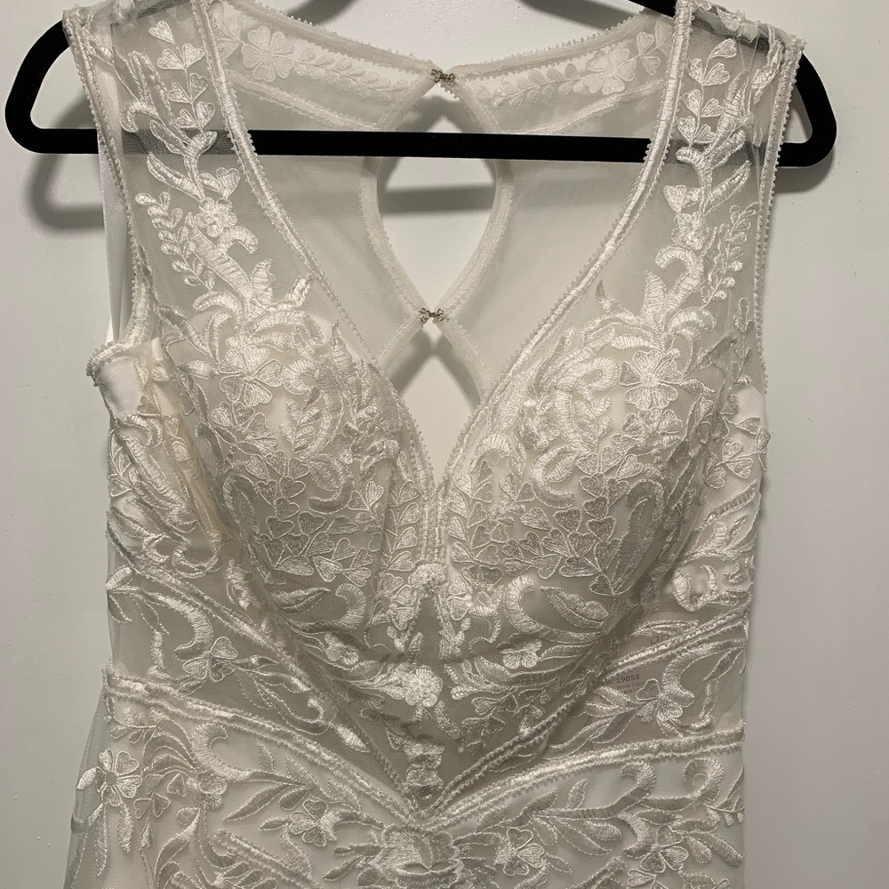 Wedding dress, new w tags on.